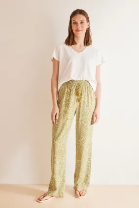 Green ethnic print trousers