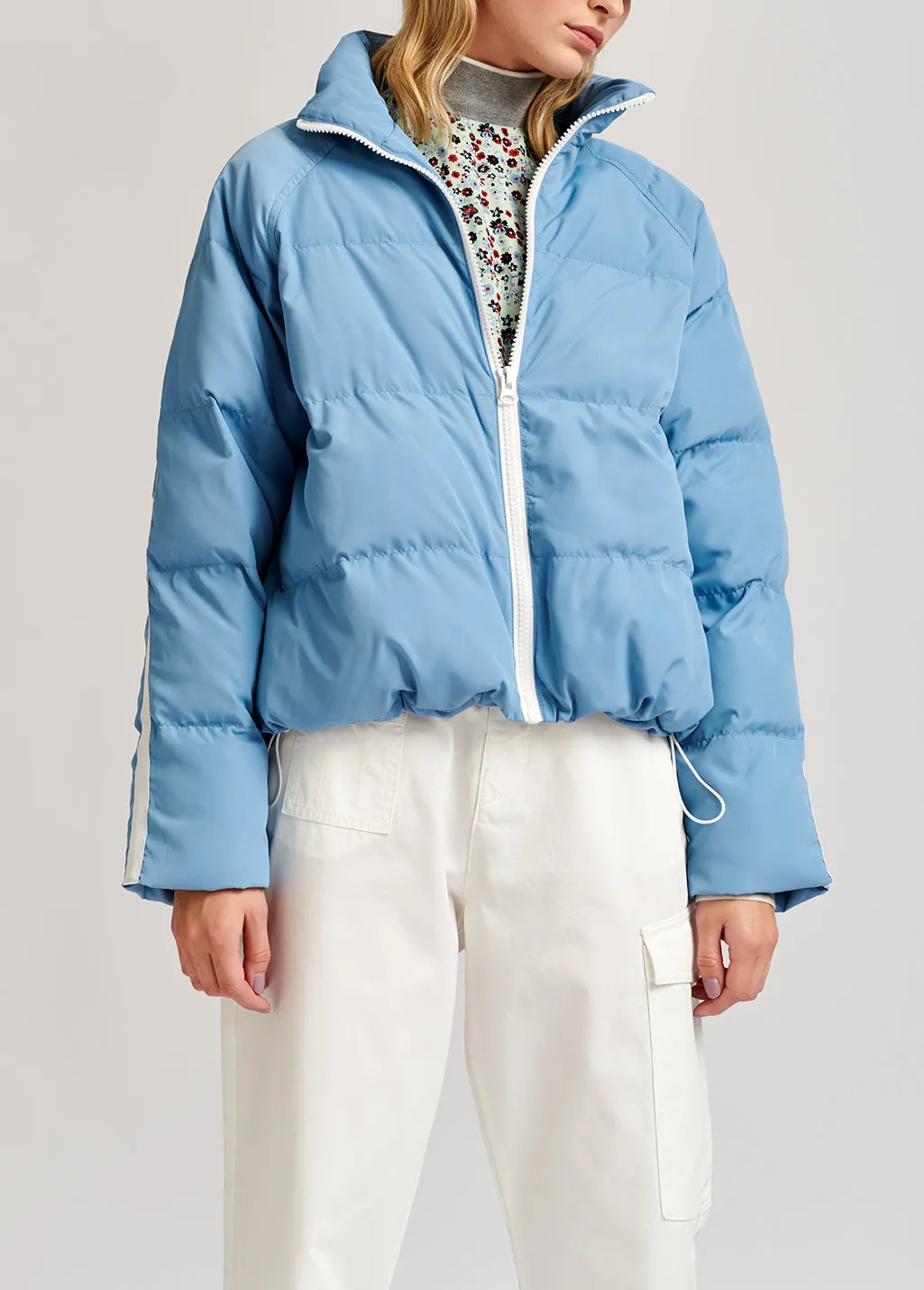 Light blue quilted down jacket