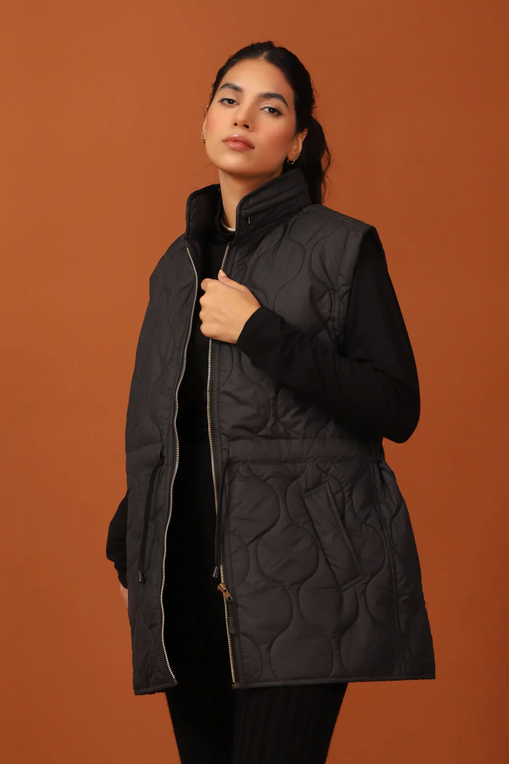 SLEEVELESS QUILTED JACKET